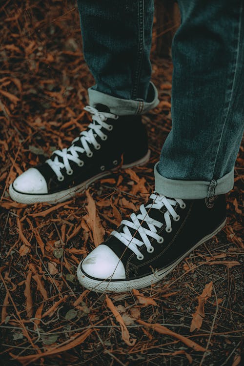 Blue Denim Jeans Beside Black and White Converse Shoes Free