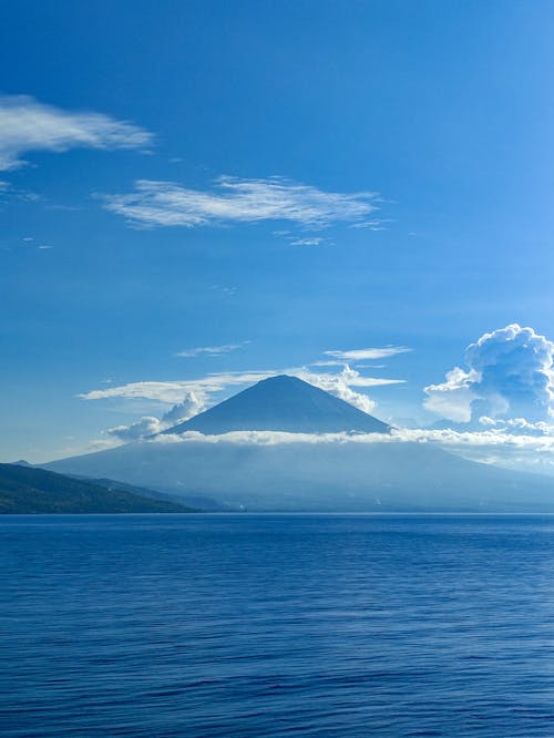 Volcano by the Sea with Its Peak above the Clouds 