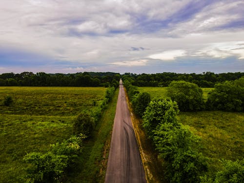 Aerial View of a Paved Road in the Countryside