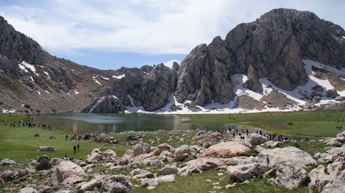 Lake and Rocks on Hill behind