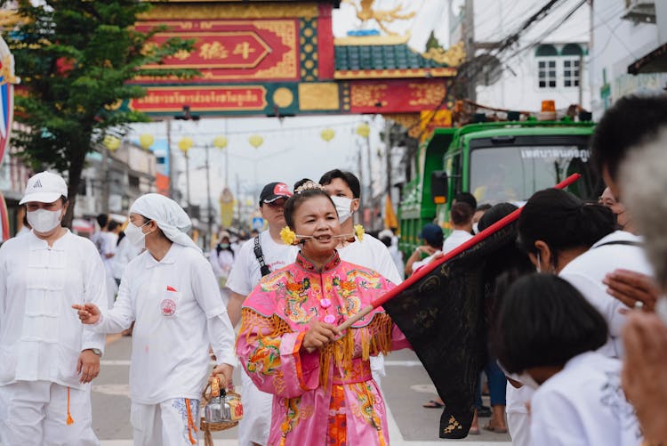 People In Traditional Clothes On Street Festival