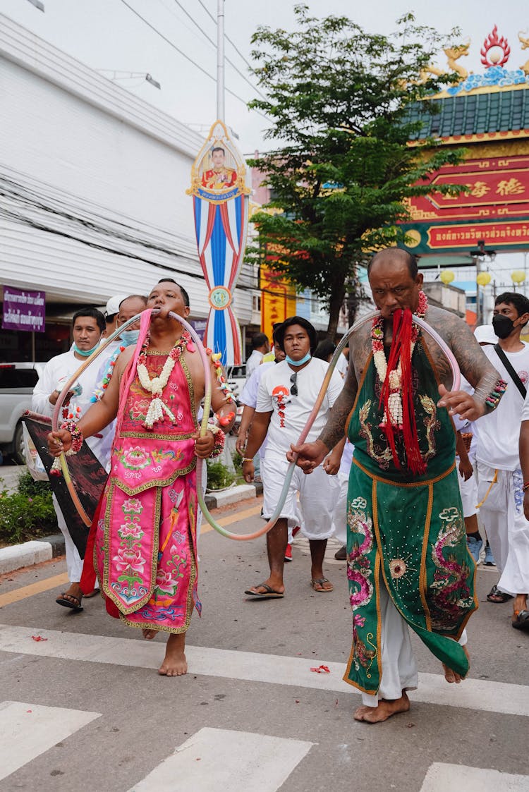 People In Traditional Costumes On City Festival