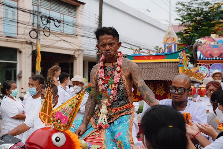 Man With Cheek Piercing On Traditional Festival