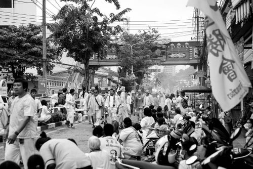 Free Vibrant street festival in Phuket, Thailand celebrating traditional culture and community spirit. Stock Photo