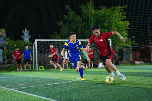 Darmowe zdjęcie z galerii z boisko piłkarskie, dopasowanie, futbol