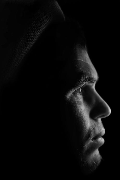 Free A Grayscale Photo of a Man's Face Stock Photo