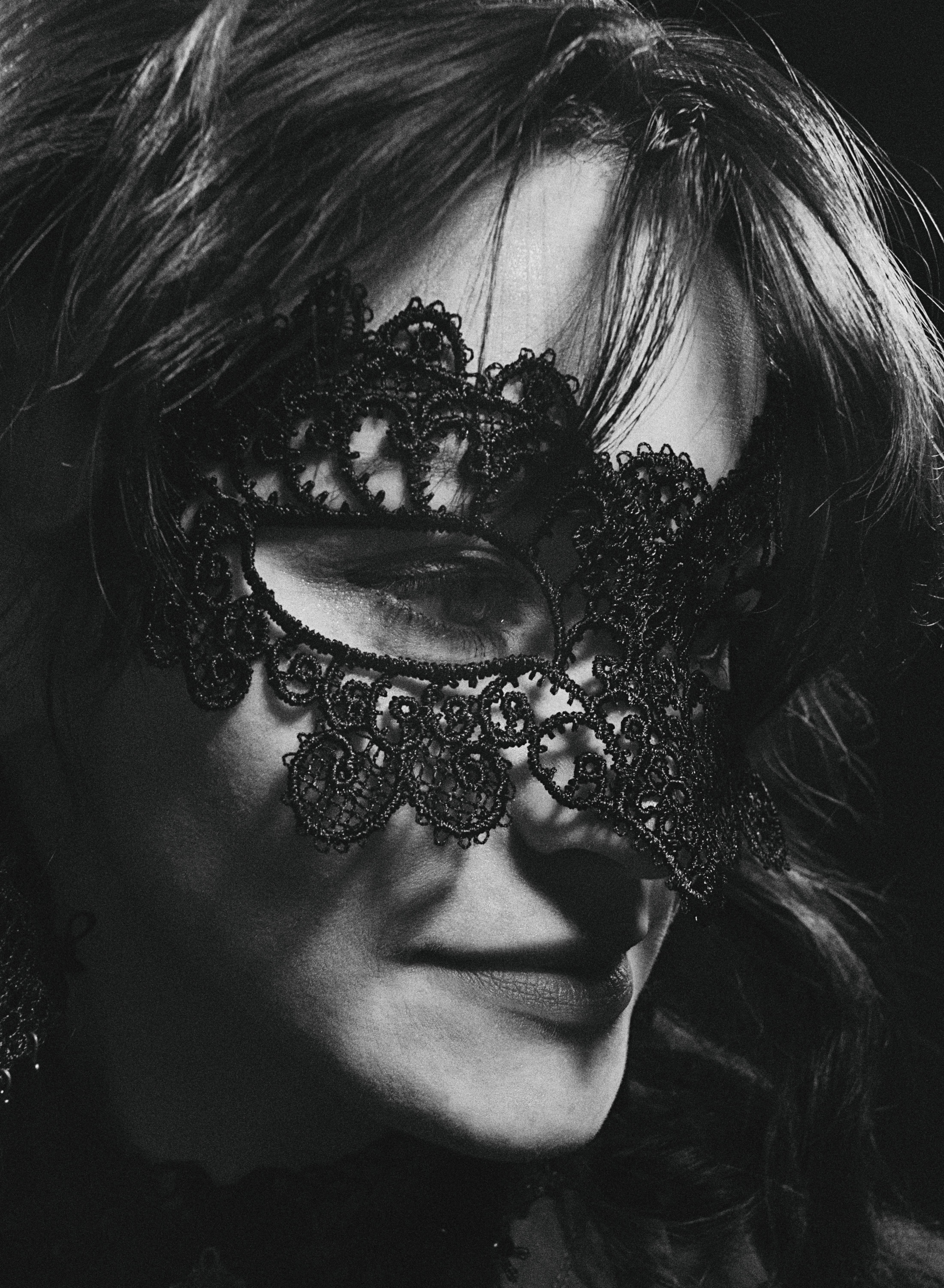 A Woman Wearing Black Mask · Free Stock Photo