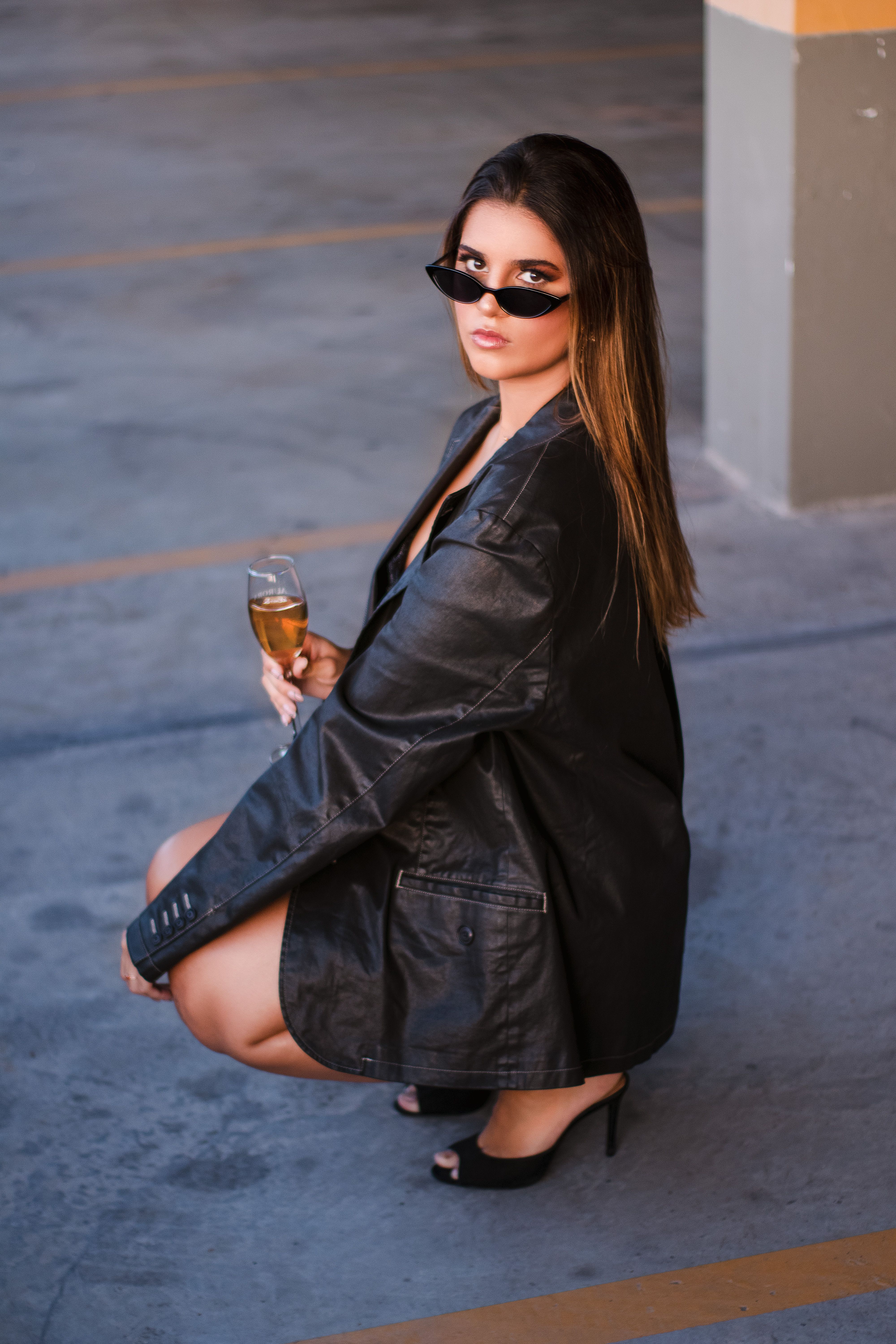 Woman in Black Leather Jacket Wearing Black Sunglasses · Free Stock Photo