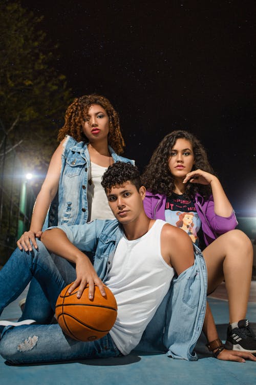 Free Two Girls and a Boy with a Basketball  Stock Photo