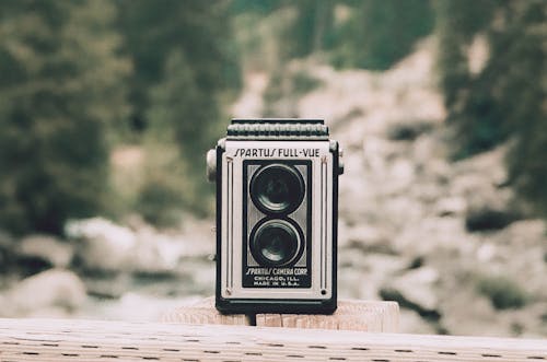 Free Person Showing Vintage Gray and Black Camera Stock Photo