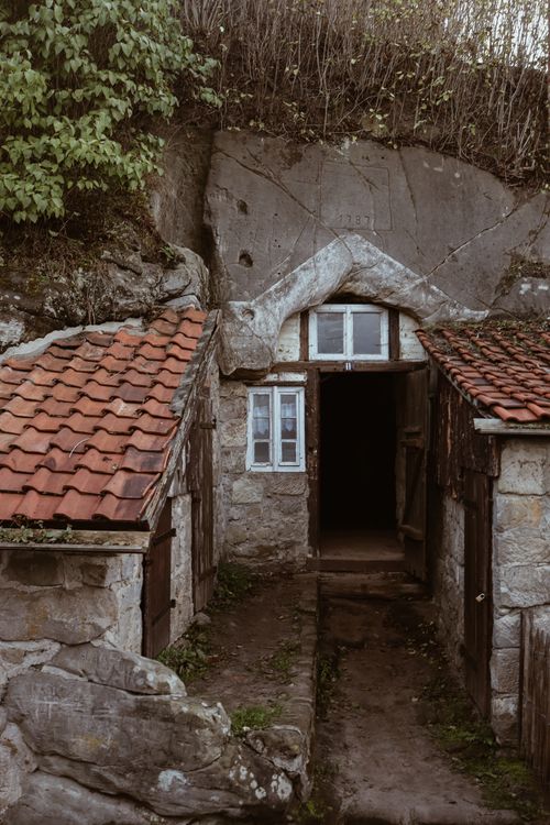 Free Explore this old stone house with a red-tiled roof, nestled in the Harz region, Germany. Stock Photo