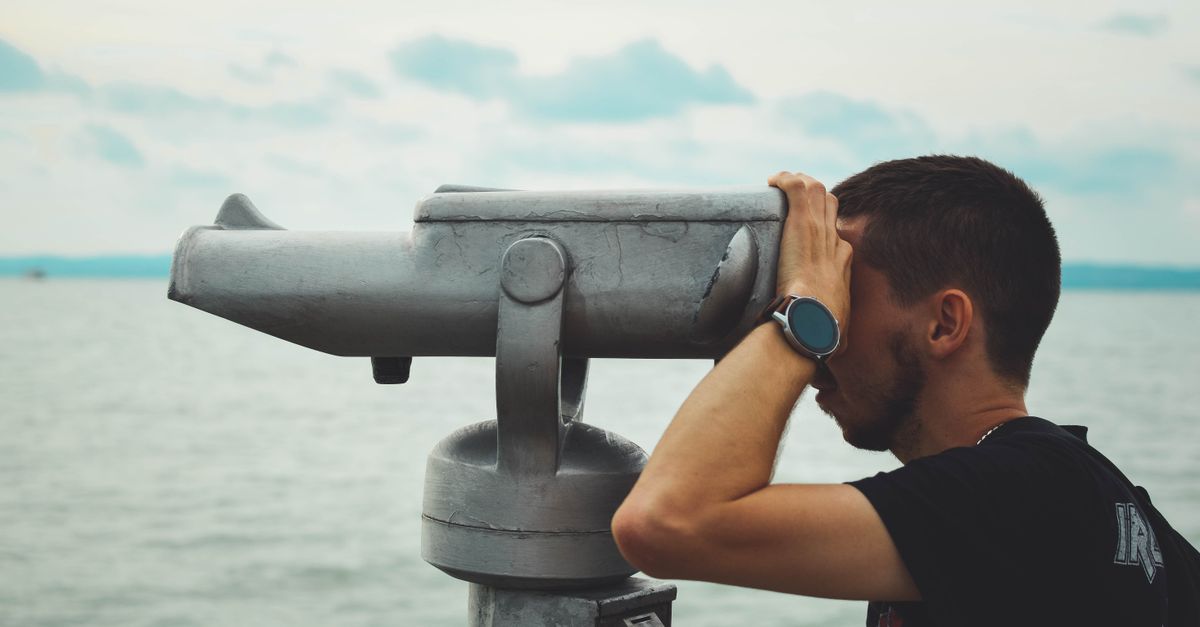 A pair of binoculars resting on a flat surface representing ongoing competitor monitoring as part of a SpyFu alternative strategy
