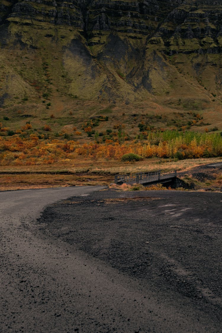 Mud Road In Mountains Landscape