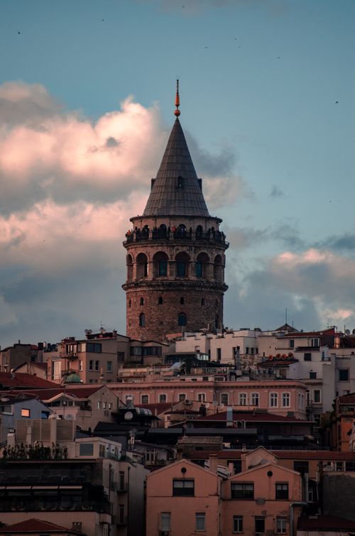 Free Stunning aerial view of the iconic Galata Tower amidst the vibrant cityscape of Istanbul, Turkey. Stock Photo