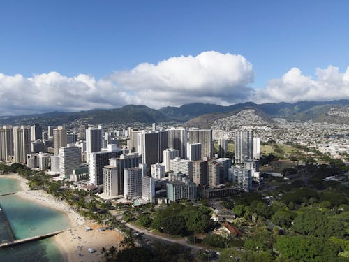 Aerial Photography of High Rise Buildings in the City under the Cloudy Sky