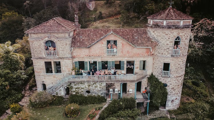 Aerial View Of People Standing On A Balcony Of A Castelo Dos Riachos In Brazil 