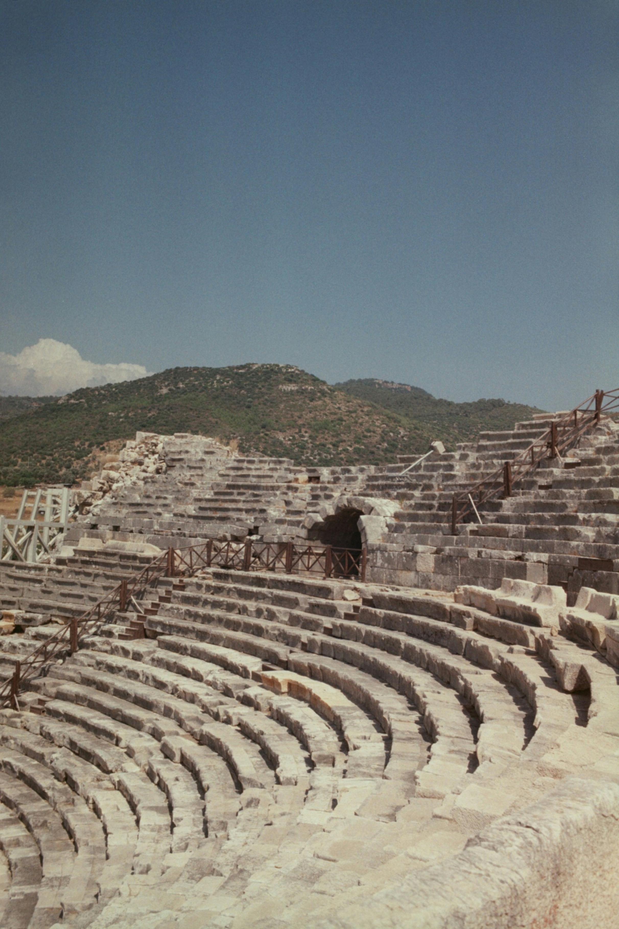 Free Explore the ancient Roman amphitheater in Antalya, Turkey under clear blue skies. Stock Photo