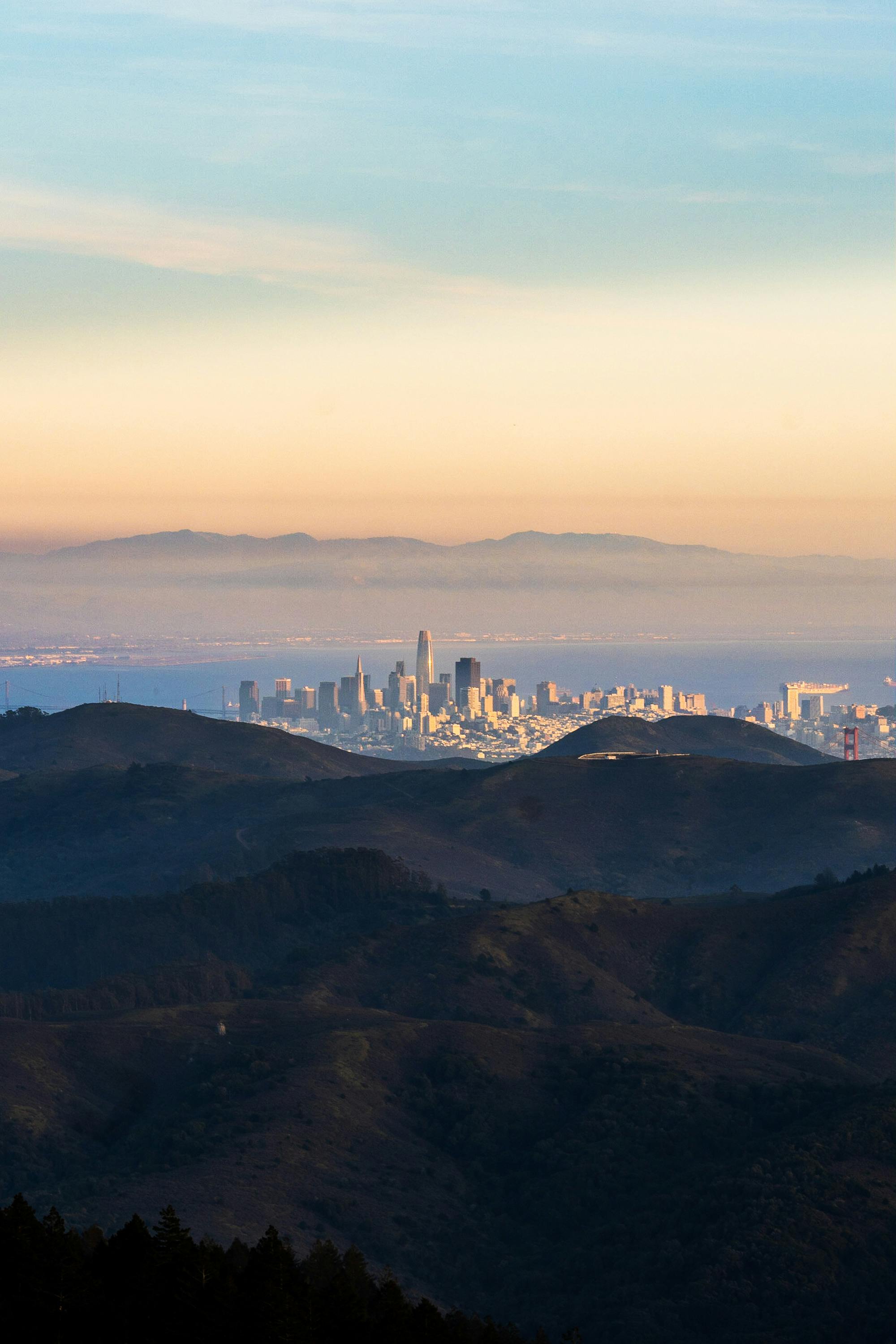 Scenic view of San Francisco skyline at dawn, seen from hills in Sausalito, California.