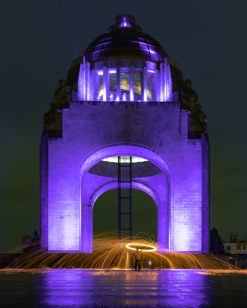 A Monument to the Revolution with Lights at Night