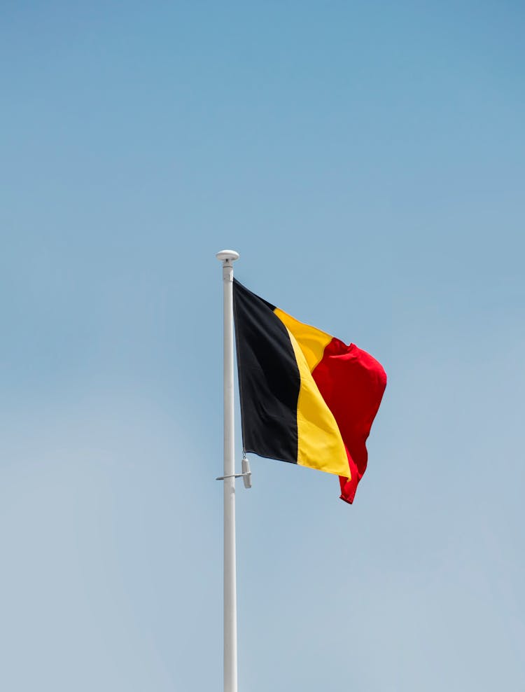 Belgium National Flag Swaying On The Flagpole