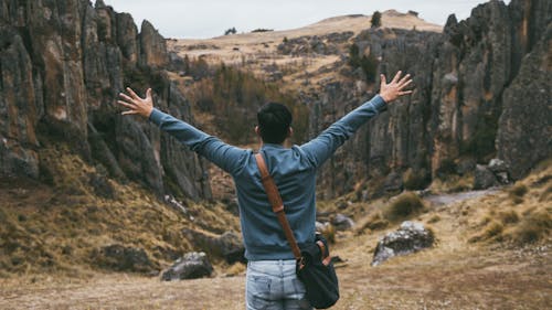 Man Standing on Mountain Area