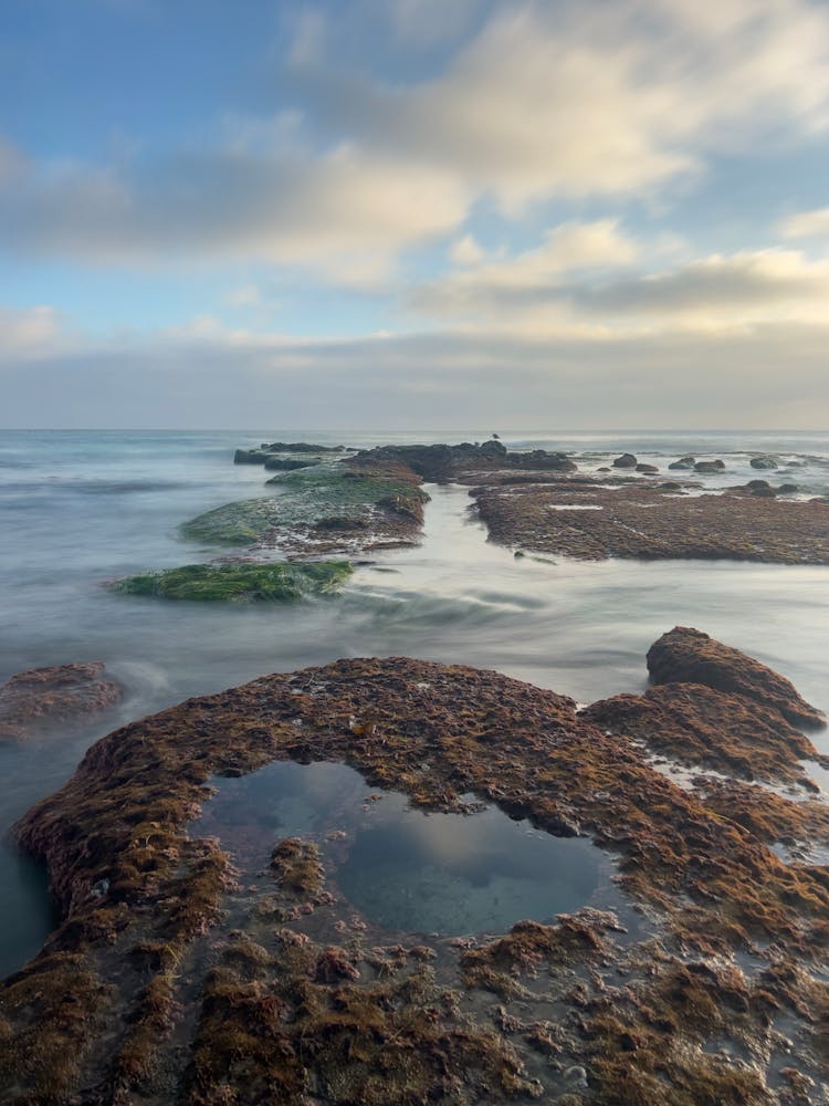 Rocks Portruding From Sea