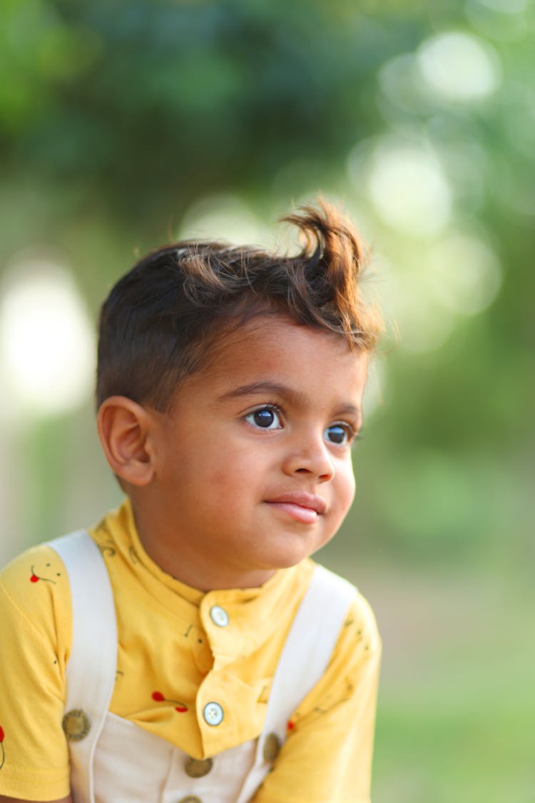 Child In Yellow Shirt