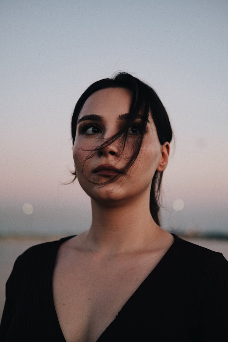 Young Woman Posing Near Sea