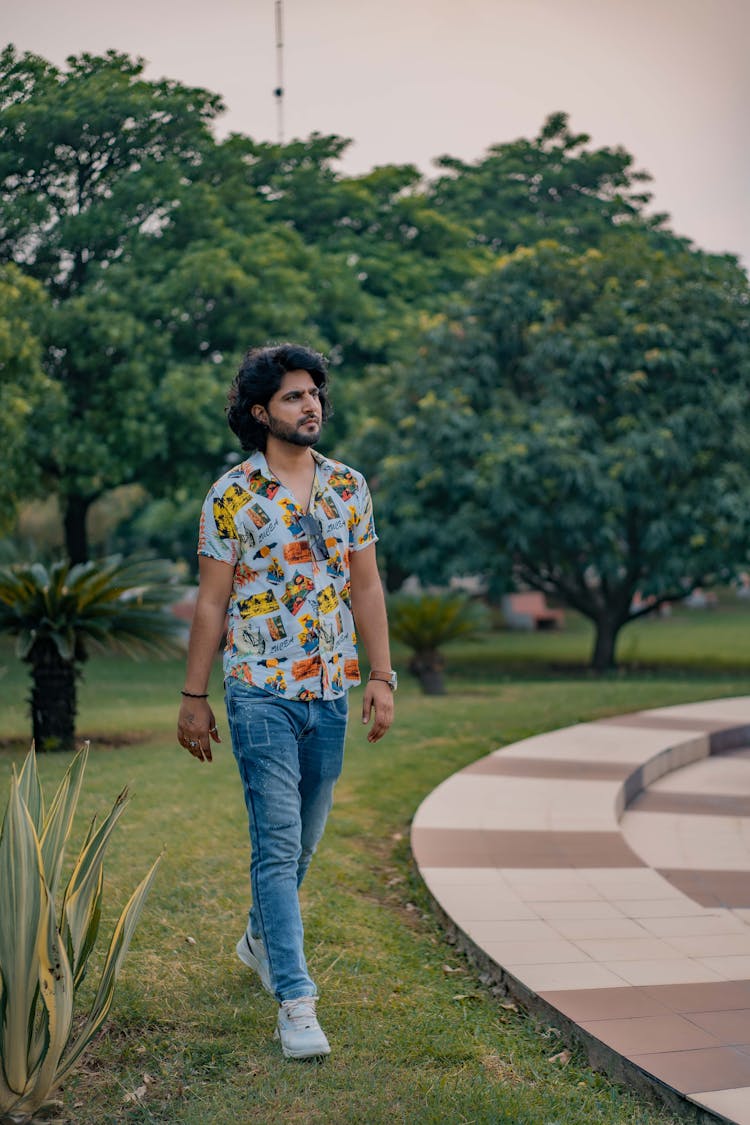 Man Walking In Park