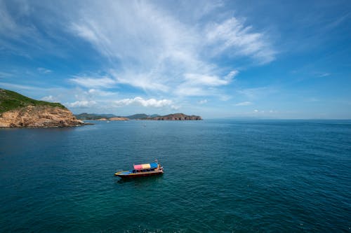 Gratis lagerfoto af båd, blå himmel, hav