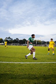 Athletes in action during a competitive soccer match at Lommel, capturing dynamic plays and team spirit.