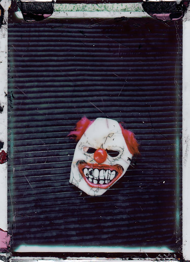 Clown Halloween Mask On A Shutter