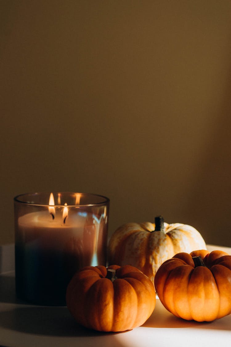 Still Life With Pumpkins And A Candle 