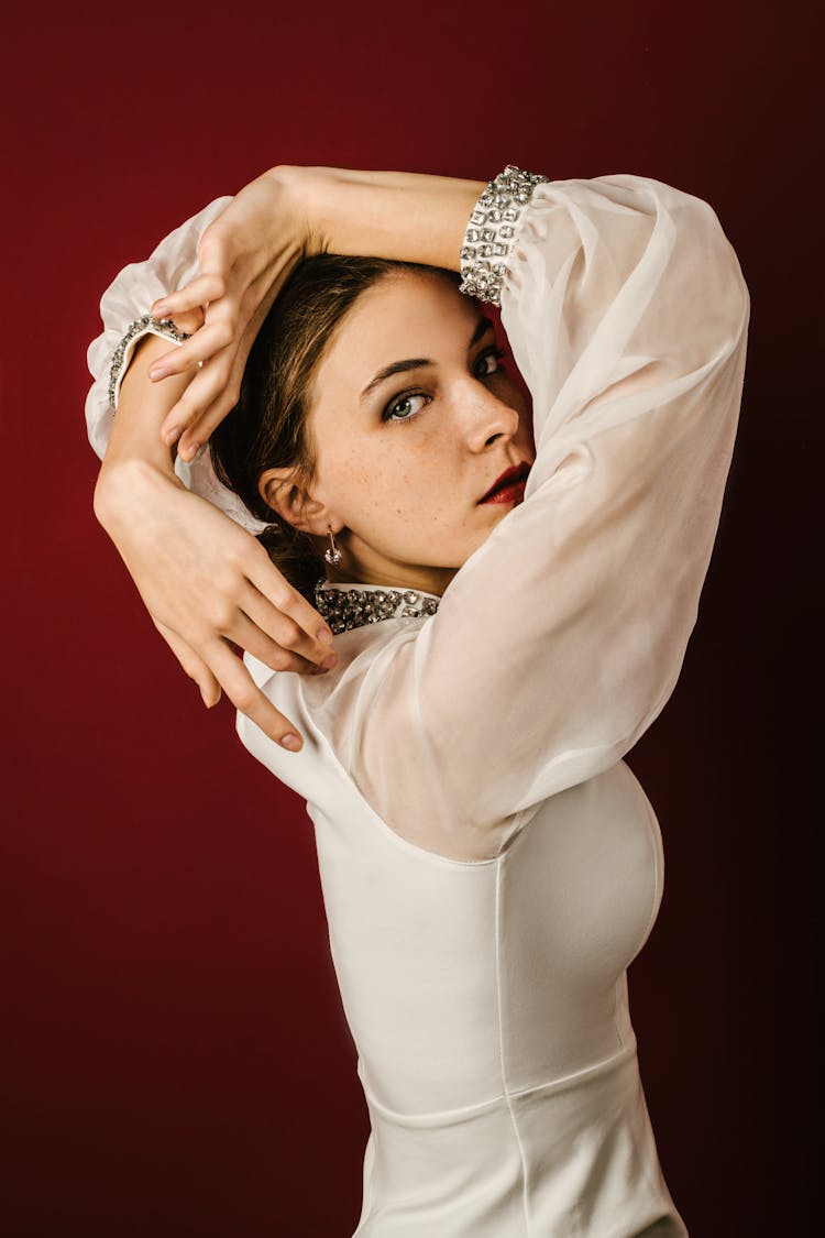 Model Posing In Wedding Dress With Diamond Decorations