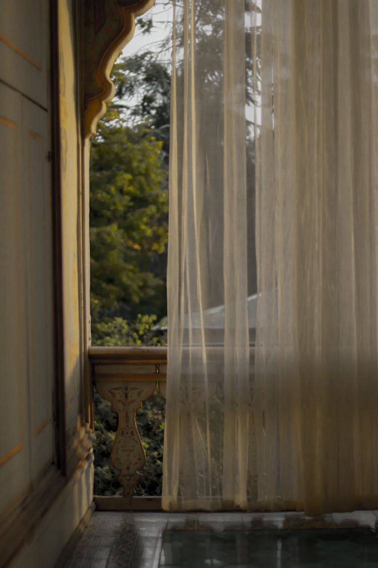 White Sheer Curtain On Window