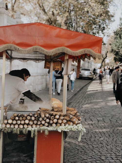 A Man Selling Corn in the Street