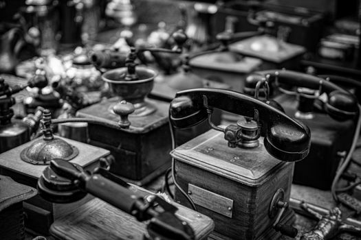 A collection of antique telephones in black and white. Captured in Madrid.