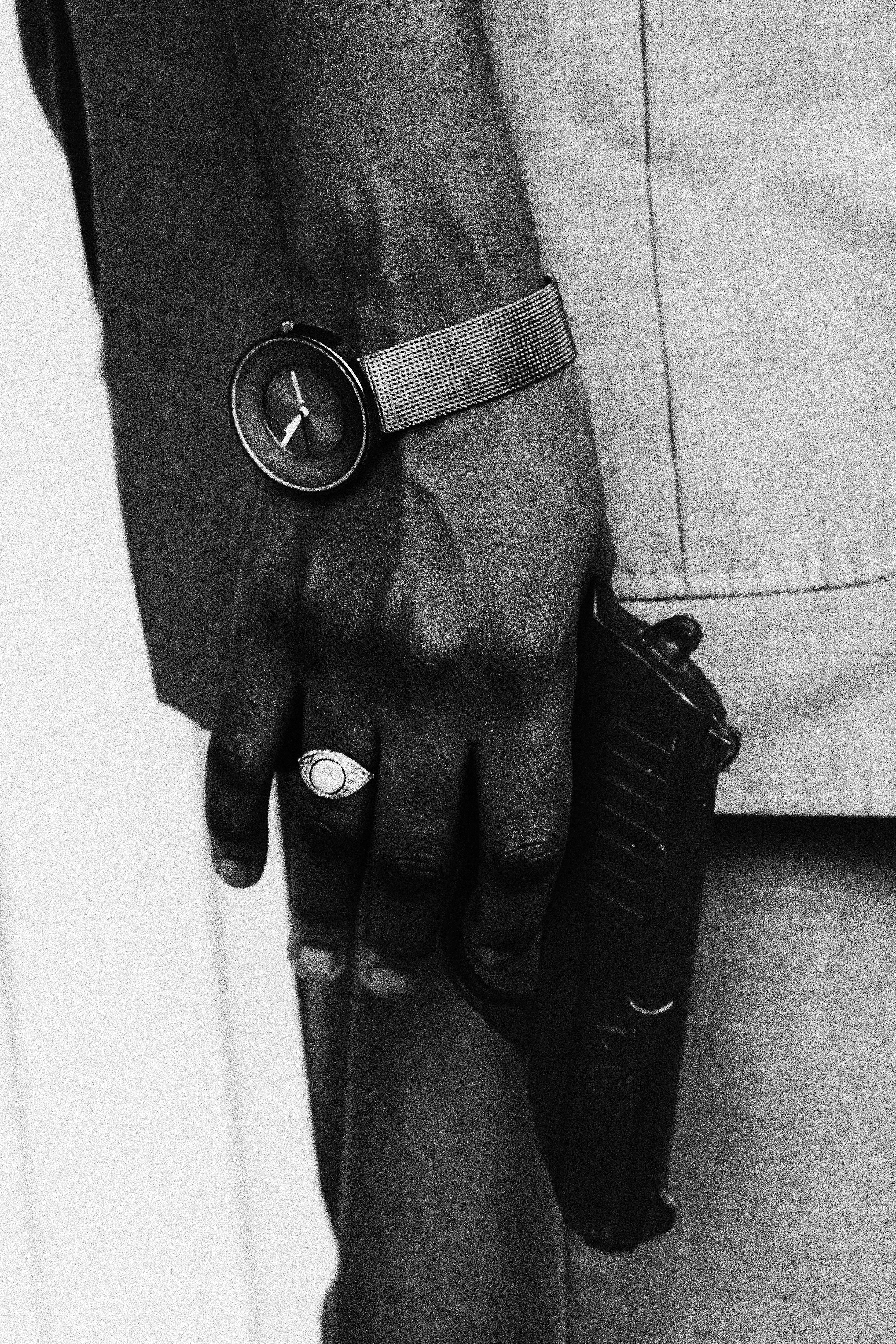 Closeup of Hand Holding a Gun · Free Stock Photo