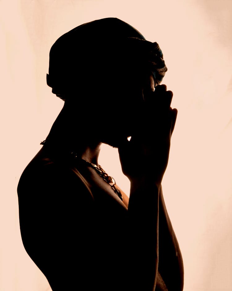 Silhouette Of Person Against Bright Bac