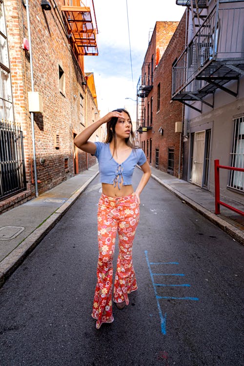 Woman in Crop Top and Floral Pants