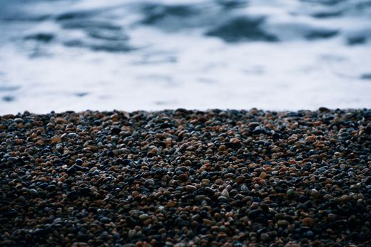 Waves on a pebble shore — Marc Puddy on Pexels