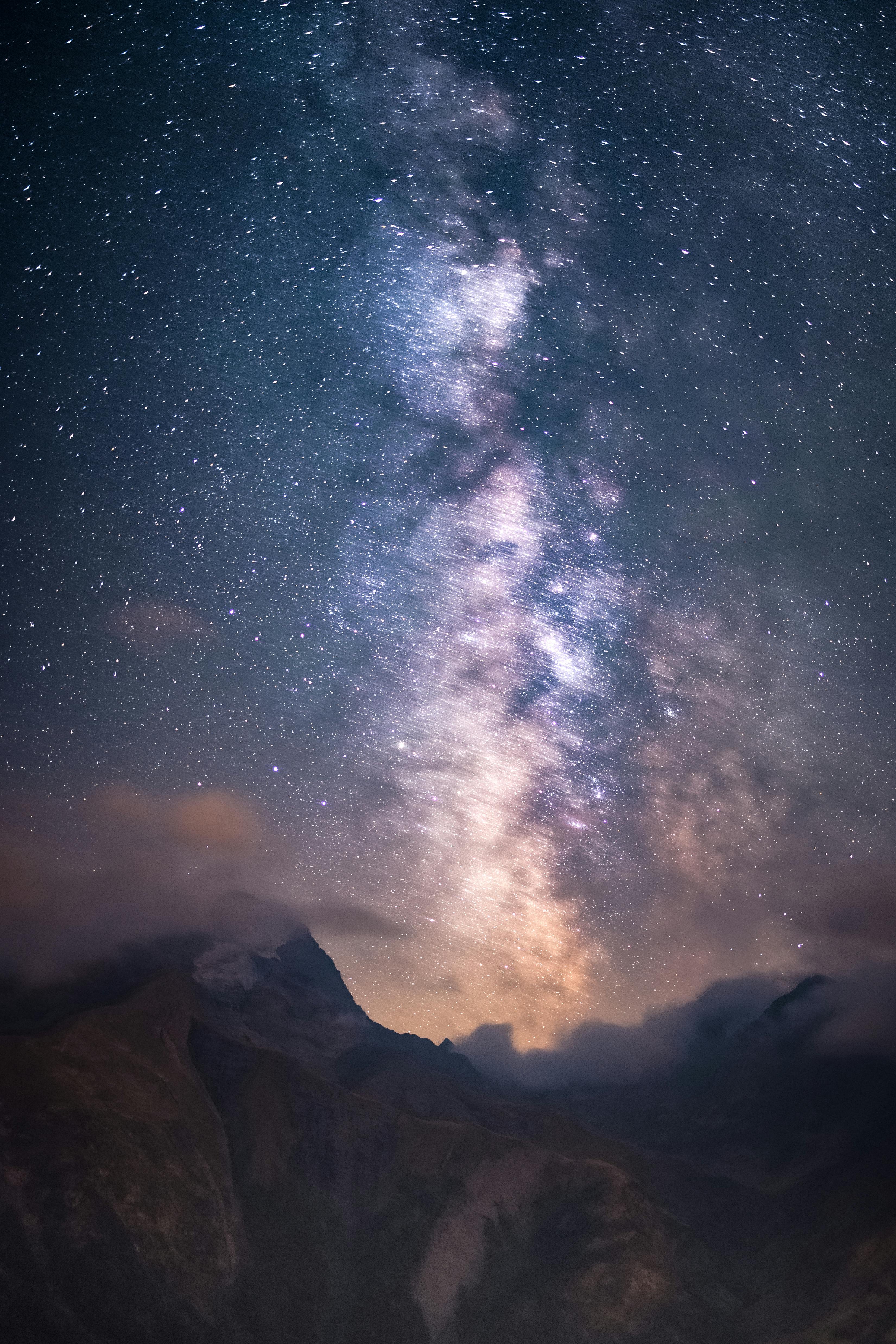 Breathtaking view of the Milky Way over alpine mountains, a perfect blend of nature and astronomy.