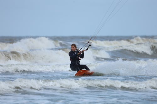 Photograph of a Woman Kitesurfing