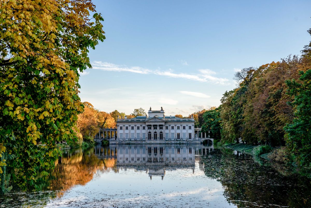 The Palace on the Isle in Lazienki park, reflected in the lake among trees