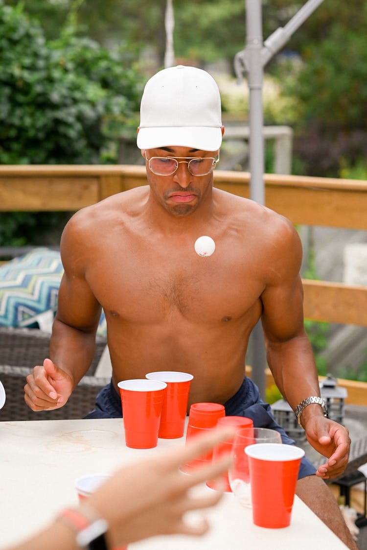 Boy Playing Beer Pong