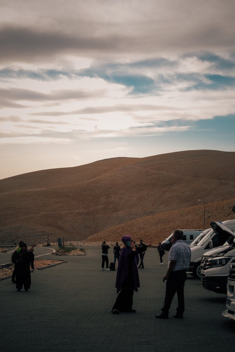 People Stopping On The Roadside To Rest