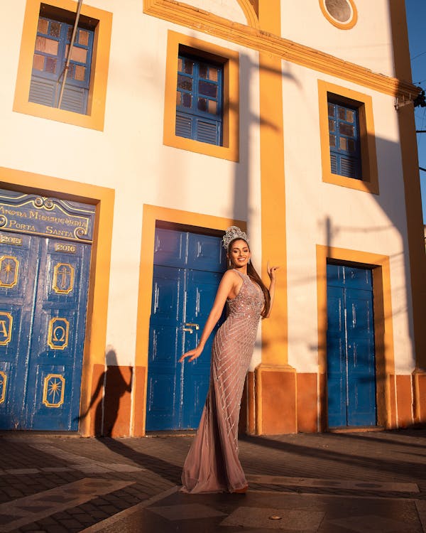 Free A Woman in Brown Gown Waring a Crown Stock Photo