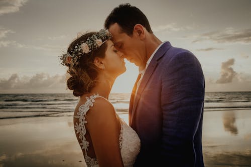 Photo of a Bride and a Groom Head to Head