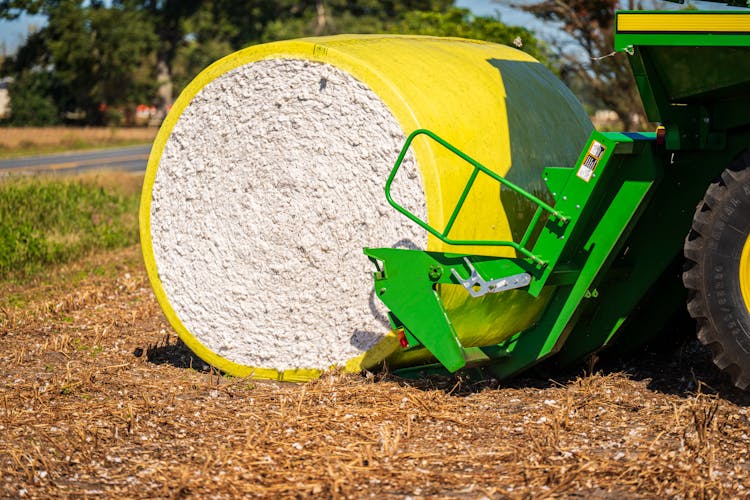 Cotton Bale On Green Tractor