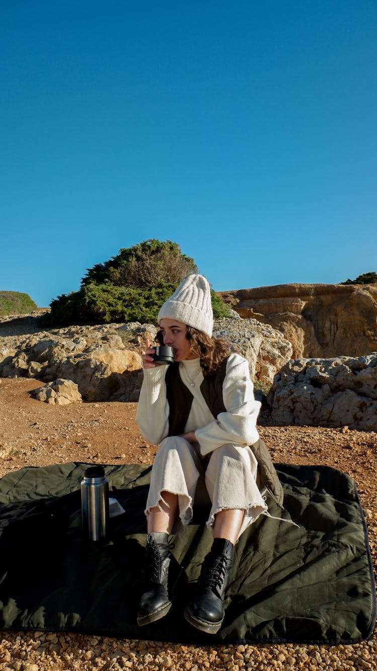 Woman Drinking From A Cup